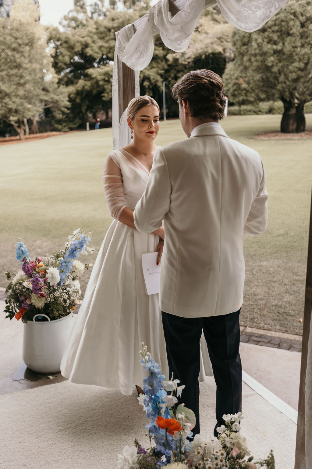 pastel wedding ceremony flowers