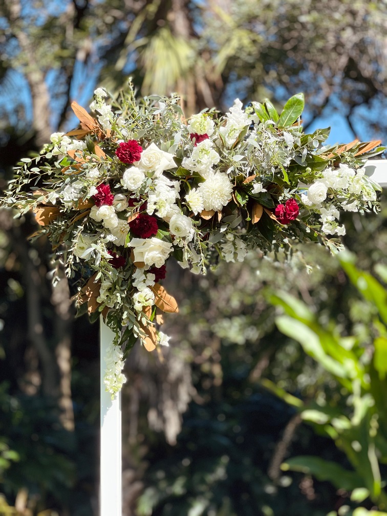 Corner wedding arbour flower arrangement