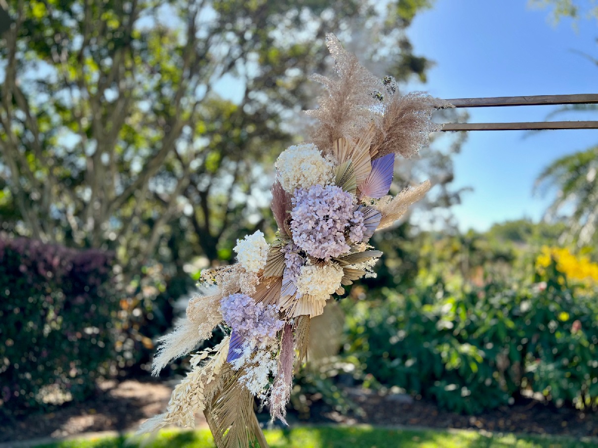 Lilac wedding arbour flowers