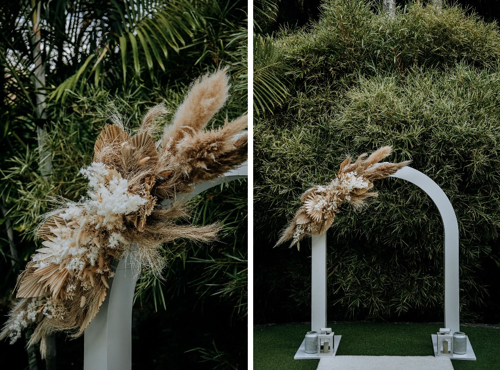 wedding arch with dried arbour flowers in natural and neutral shades