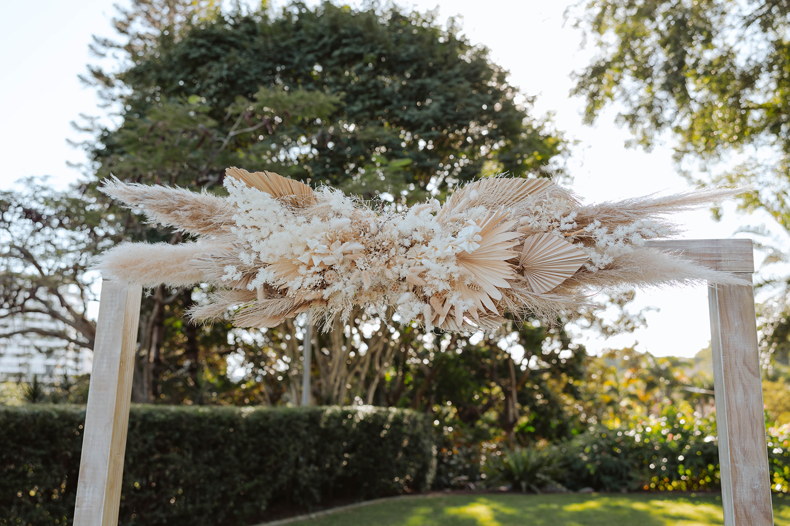 wedding arbour flowers in earthy neutral tones