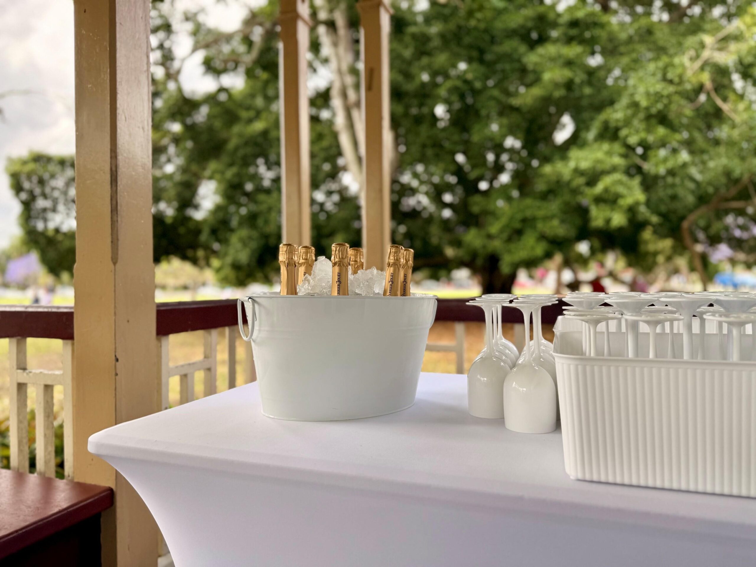 wedding champagne drink tubs beautifully set up inside New Farm Park Rotunda